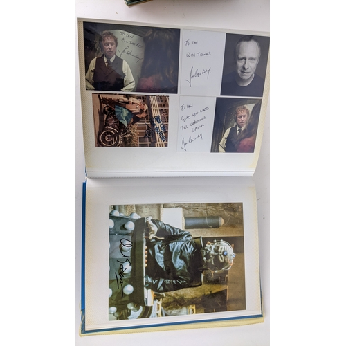 84 - A Doctor Who album of autographs on photos, signed by several cast members to include David Bradley,... 