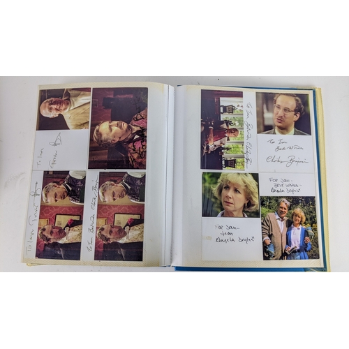 84 - A Doctor Who album of autographs on photos, signed by several cast members to include David Bradley,... 