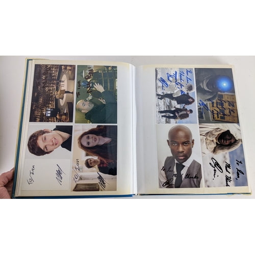 84 - A Doctor Who album of autographs on photos, signed by several cast members to include David Bradley,... 