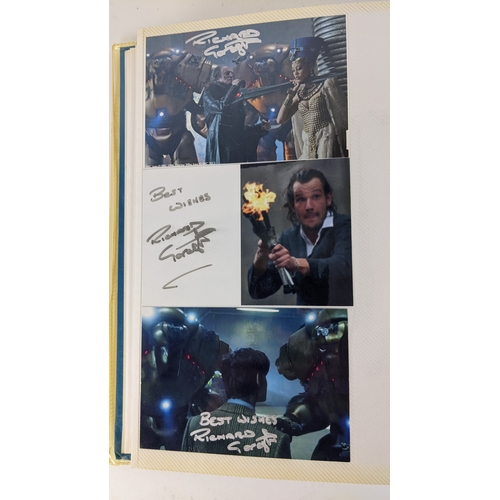 84 - A Doctor Who album of autographs on photos, signed by several cast members to include David Bradley,... 