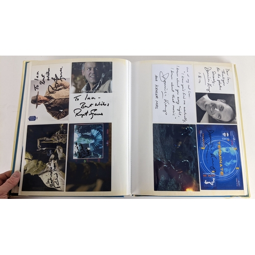84 - A Doctor Who album of autographs on photos, signed by several cast members to include David Bradley,... 