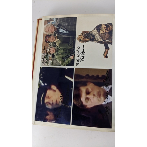 90 - A Doctor Who album of autographs on photos, signed by several cast members to include Tom Baker, Kar... 
