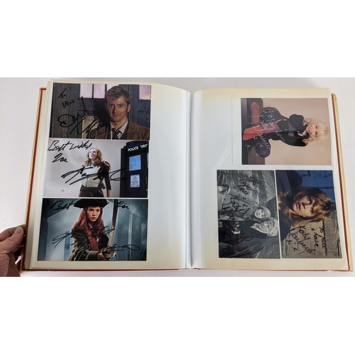 90 - A Doctor Who album of autographs on photos, signed by several cast members to include Tom Baker, Kar... 