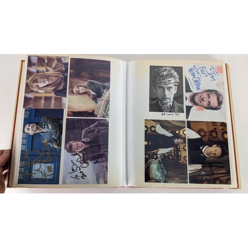 90 - A Doctor Who album of autographs on photos, signed by several cast members to include Tom Baker, Kar... 