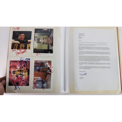90 - A Doctor Who album of autographs on photos, signed by several cast members to include Tom Baker, Kar... 