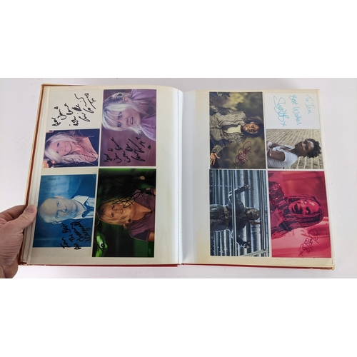 90 - A Doctor Who album of autographs on photos, signed by several cast members to include Tom Baker, Kar... 