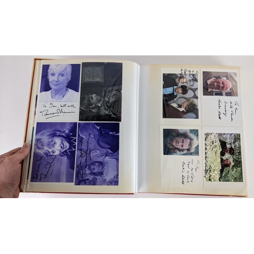 90 - A Doctor Who album of autographs on photos, signed by several cast members to include Tom Baker, Kar... 