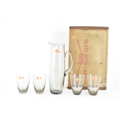 92 - Per Lutken for Holmegaard Glass, a mid-century Roskilde mixer jug and tumbler set in smoke grey tint... 