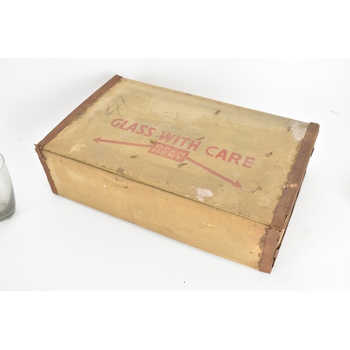 92 - Per Lutken for Holmegaard Glass, a mid-century Roskilde mixer jug and tumbler set in smoke grey tint... 