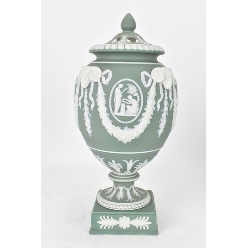 99 - A Wedgwood green jasperware covered pot pourri urn, of ovoid form with domed pierced cover and inner... 