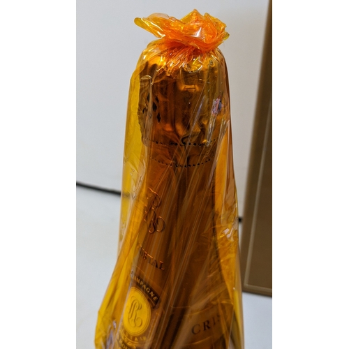 230 - A bottle of Louis Roederer Cristal Champagne, vintage 1997, Brut, 12% vol, in original sealed gold c... 