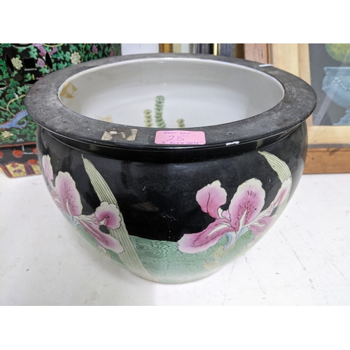 25 - A late 20th century Chinese porcelain garden seat A/F, and a Chinese fish bowl decorated with iris' ... 