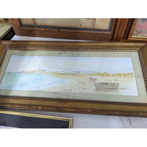 29 - A mixed quantity of framed and glazed prints, together with an unsigned coastal watercolour to inclu... 