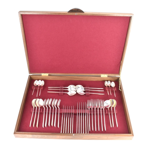 A modern canteen of Apollo silver cutlery designed and made by Martyn Pugh, hallmarked Birmingham 2010, consisting of six table forks, six dessert forks, six table knives, six dessert knifes, six dessert spoons, six soup spoons, six teaspoons, with original receipt, purchased for £9200, the knives weighing 666.2 grams, combined weight excluding knives 2178.5 grams
If there is no condition report, please request.