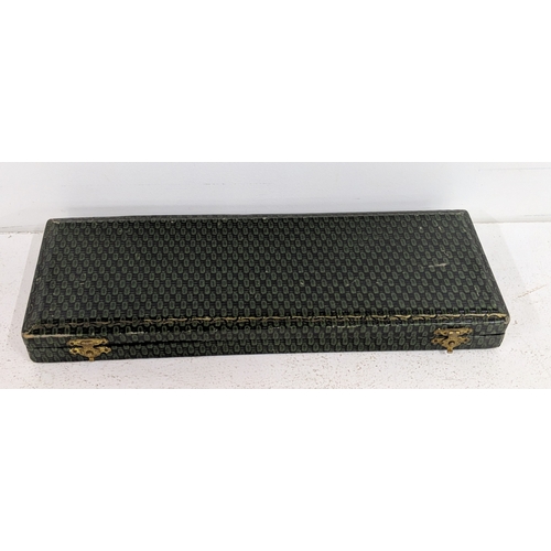 22 - Circa 1925 a French silver plated cased desk set to include a letter opener, a seal, a silver cased ... 