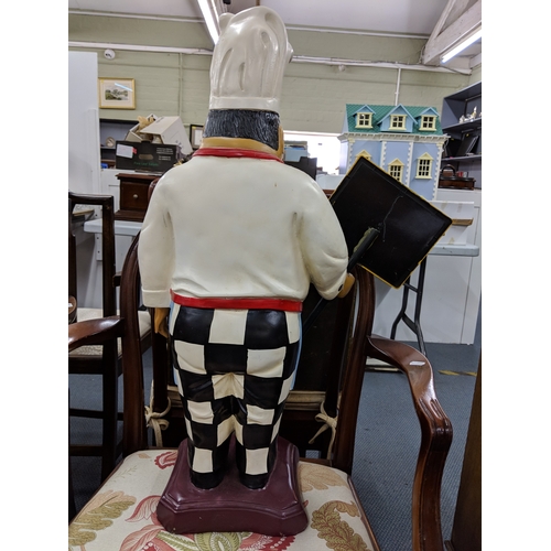 45 - A modern café/restaurant display fashioned as a smiling chef holding a menu board, 70cm h
Location: ... 