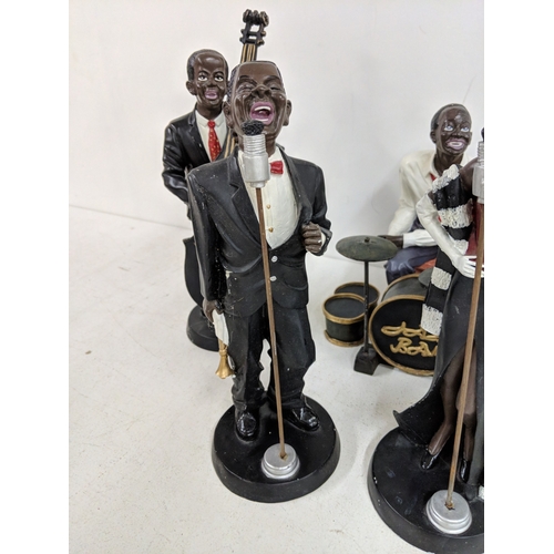 52 - Five jazz band figurines to include, two signers, a pianist a drummer and a double bass player A/F
L... 