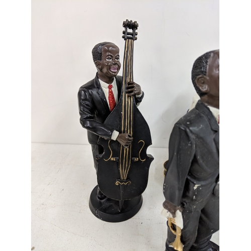 52 - Five jazz band figurines to include, two signers, a pianist a drummer and a double bass player A/F
L... 