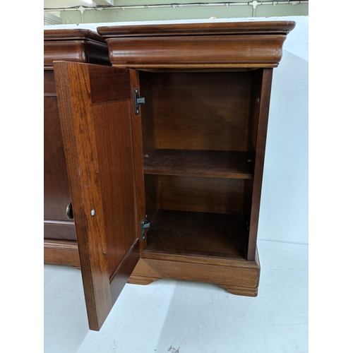 58 - A pair of modern bedside cabinets with a single drawer over a panelled door
Location: A4M
If there i... 