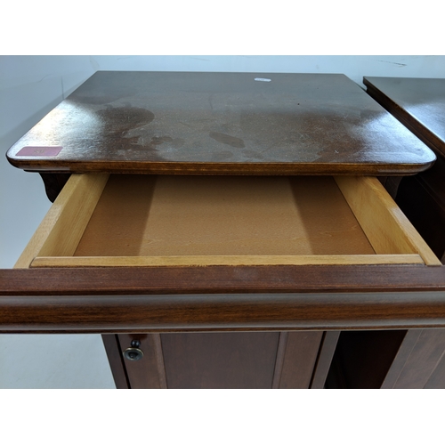 58 - A pair of modern bedside cabinets with a single drawer over a panelled door
Location: A4M
If there i... 