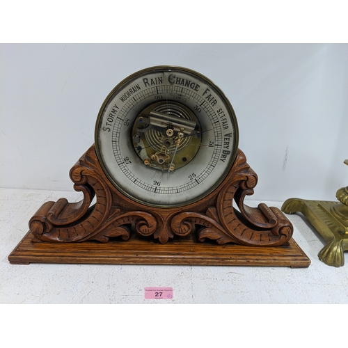 27 - A Victorian brass oil lamp with a glass funnel and a Victorian barometer on an oak stand A/F
Locatio... 