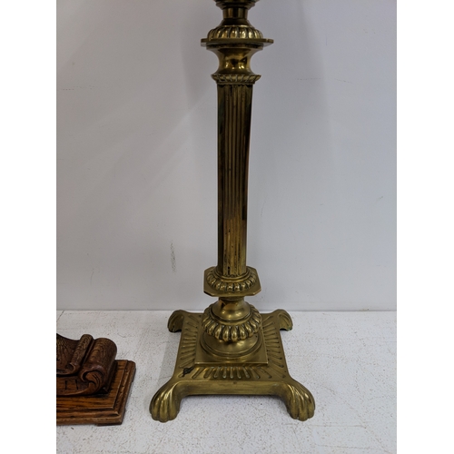 27 - A Victorian brass oil lamp with a glass funnel and a Victorian barometer on an oak stand A/F
Locatio... 