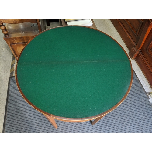 31 - ***THIS LOT HAS BEEN WITHDRAWN***A George III inlaid mahogany fold over card table
Location: FOYER
I... 