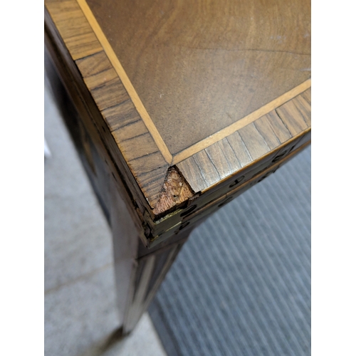 31 - ***THIS LOT HAS BEEN WITHDRAWN***A George III inlaid mahogany fold over card table
Location: FOYER
I... 