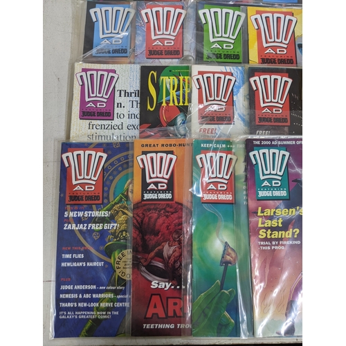31 - A large quantity of mainly 1990's 2000AD magazines, mostly featuring Judge Dread, all in protective ... 