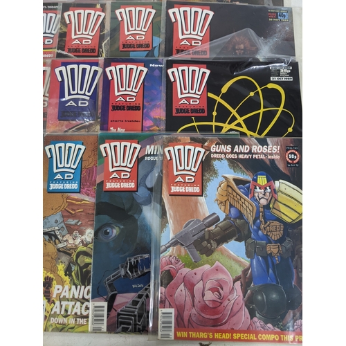 31 - A large quantity of mainly 1990's 2000AD magazines, mostly featuring Judge Dread, all in protective ... 