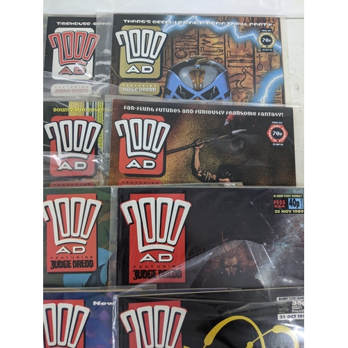 31 - A large quantity of mainly 1990's 2000AD magazines, mostly featuring Judge Dread, all in protective ... 