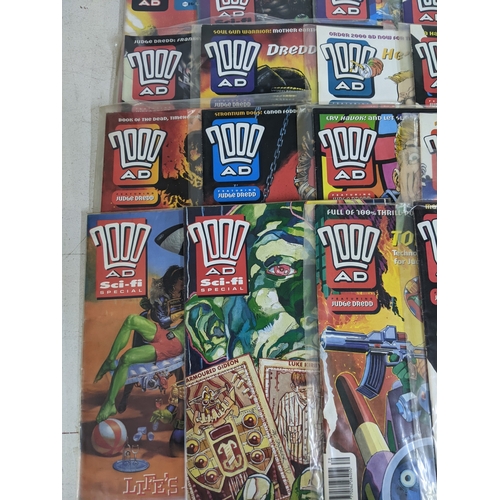 31 - A large quantity of mainly 1990's 2000AD magazines, mostly featuring Judge Dread, all in protective ... 