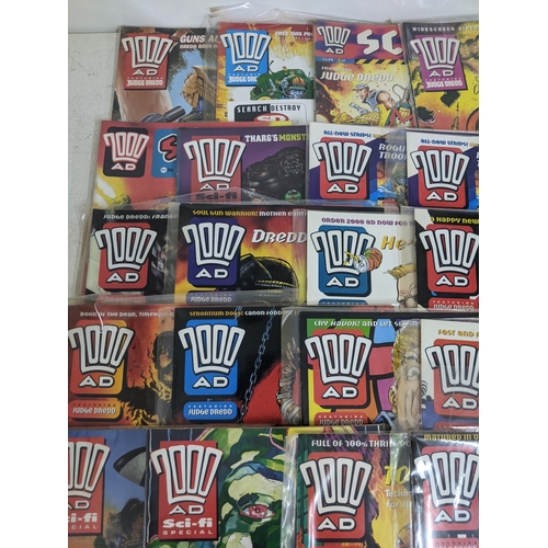 31 - A large quantity of mainly 1990's 2000AD magazines, mostly featuring Judge Dread, all in protective ... 