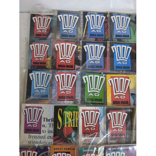 31 - A large quantity of mainly 1990's 2000AD magazines, mostly featuring Judge Dread, all in protective ... 