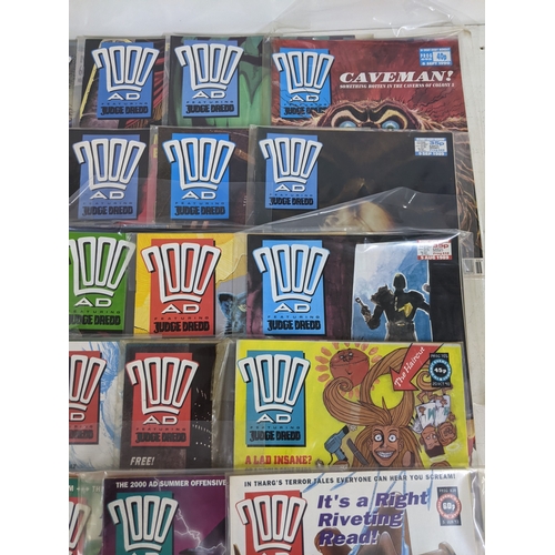 31 - A large quantity of mainly 1990's 2000AD magazines, mostly featuring Judge Dread, all in protective ... 
