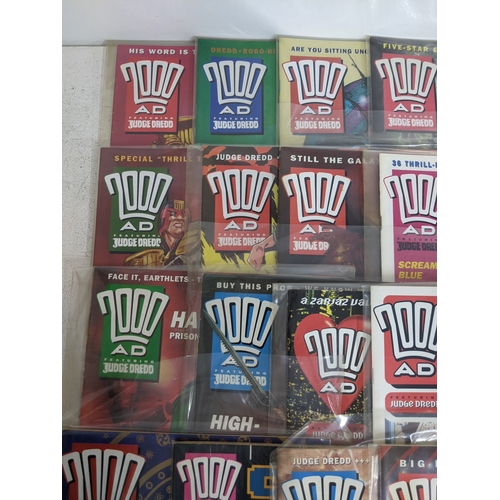 31 - A large quantity of mainly 1990's 2000AD magazines, mostly featuring Judge Dread, all in protective ... 