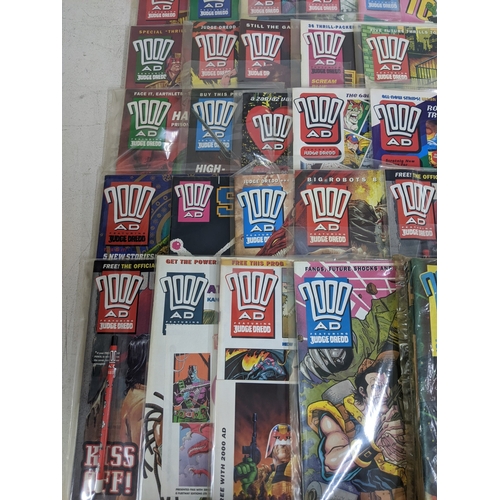 31 - A large quantity of mainly 1990's 2000AD magazines, mostly featuring Judge Dread, all in protective ... 