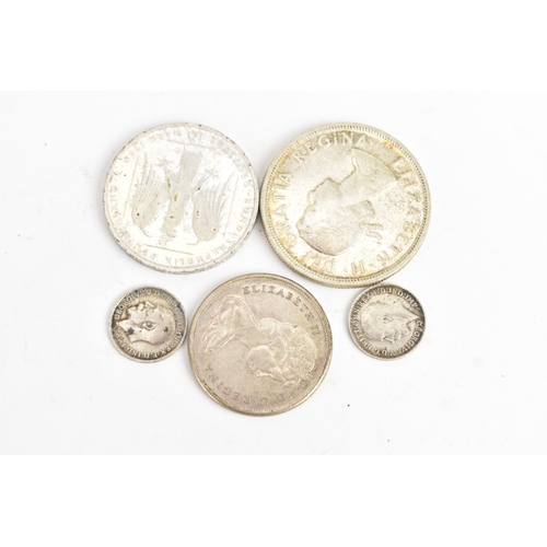 25 - A group of six coins to include a Charles I (1625–1649) hammered silver shilling, having triangle in... 