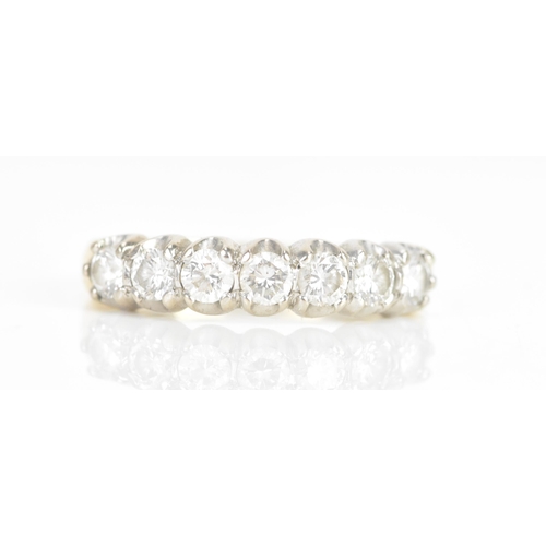 A diamond 18ct yellow and white gold seven stone ring, each diamond measuring approximately 2.8mm, calculated individual weight 0.08ct, stamped 750, ring size R 1/2, 5.2 grams
Location: R2
If there is no condition report shown, please request