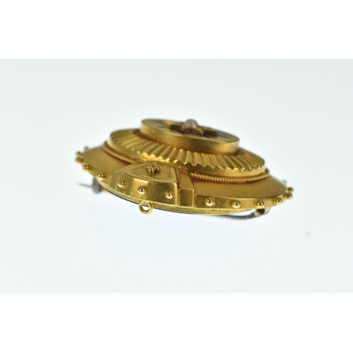 21 - A Victorian yellow gold mourning brooch, set with a central pearl in a star formed setting with blue... 