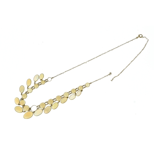 28 - An opal 9ct gold opal necklace, set with twenty-six graduated oval cabochon opals  individually beze... 