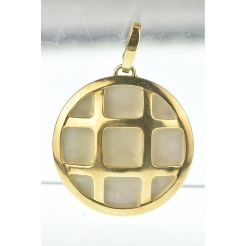 32 - A modern 18ct gold and mother-of-pearl pendant, in the Cartier design, the domed oval mother-of-pear... 