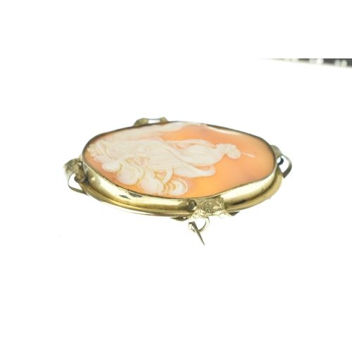 36 - A Victorian carved shell cameo gold plated brooch, depicting Hera (Juno) seated in a chariot drawn b... 
