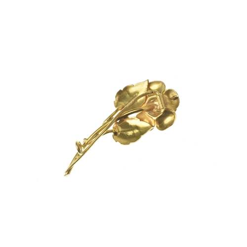 45 - A yellow gold floral spray brooch, the central flower head modelled with sculpted gold petals flanke... 