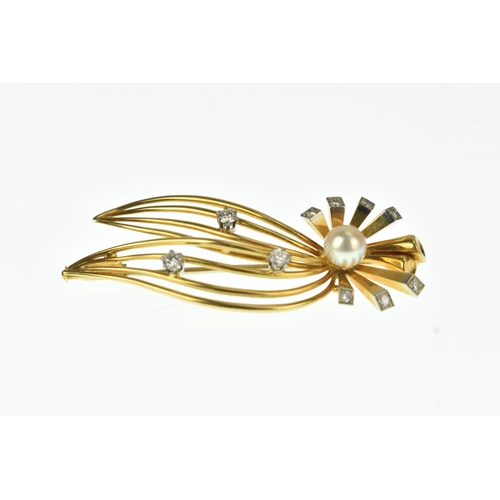 55 - A diamond and cultured pearl 18ct gold spray brooch, the central round cultured pearl surrounded by ... 