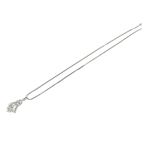 57 - A diamond cluster 18ct white gold pendant necklace, the pendant of tiered design set with round bril... 