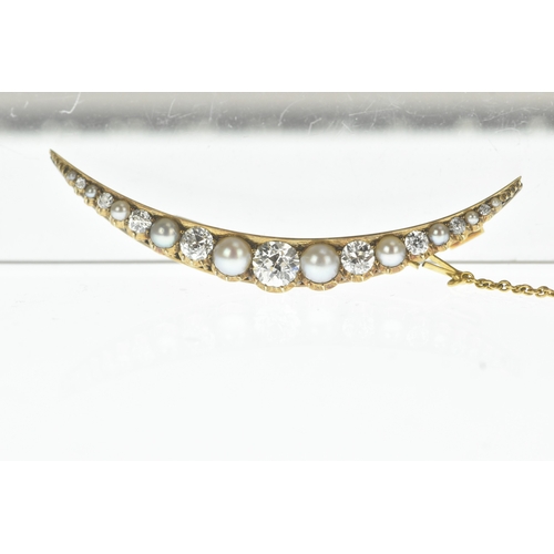 9 - A late Victorian diamond and pearl yellow gold crescent brooch, set with graduated old-cut diamonds ... 