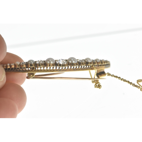 9 - A late Victorian diamond and pearl yellow gold crescent brooch, set with graduated old-cut diamonds ... 