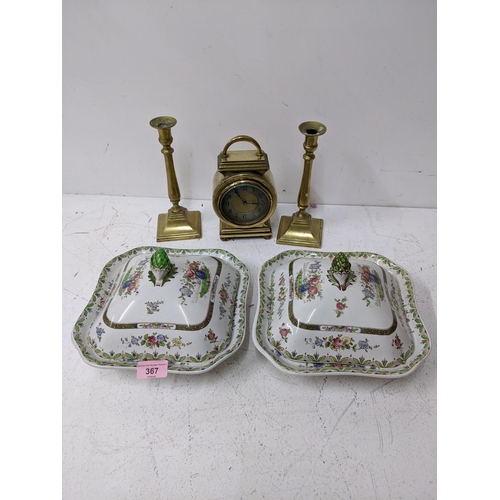 A heavy brass cased mantel clock, a pair of 19th century candlesticks ...