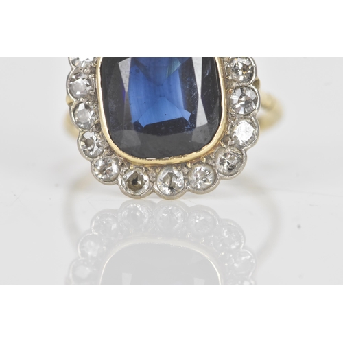 20A - An early 20th century synthetic sapphire and diamond 18ct gold cluster ring, the central cushion-cut... 